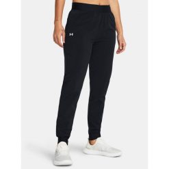 Spodnie treningowe damskie Under Armour Sport High Rise Woven. Czarne spodnie dresowe Under Armour, m, bez wzorów. Za 189.99 zł.