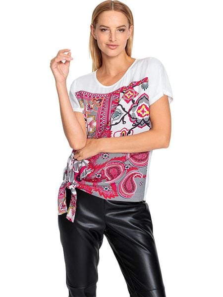 Heine Koszulka w kolorze biało-różowym rozmiar: 42. Białe bluzki Heine, bez wzorów, z wiskozy, bez kołnierzyka, bez ramiączek. Za 56.99 zł.