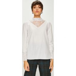 Trendyol - Bluzka. Białe bluzki Trendyol, l, bez wzorów, z bawełny, casualowe, bez kołnierzyka, bez ramiączek. W wyprzedaży za 49.90 zł.