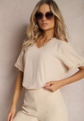Beżowa Bluzka z Wykończeniami z Koronki i Dekoltem V Mallana. Brązowe bluzki Renee, l, bez wzorów, z jeansu, eleganckie, bez kołnierzyka, bez ramiączek. W wyprzedaży za 52.49 zł.