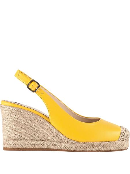 Högl Skórzane sandały "Summer" w kolorze żółtym na koturnie rozmiar: 40. Żółte sandały Högl, bez wzorów, bez obcasa, na koturnie, bez zapięcia. Za 244.80 zł.