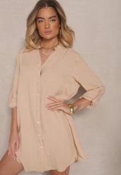Beżowa Pudełkowa Sukienka Bawełniana Oversize z Dekoltem w Serek Elavellis. Brązowe sukienki Renee, m, bez wzorów, z bawełny, bez kołnierzyka, bez ramiączek, mini, oversize. Za 69.99 zł.