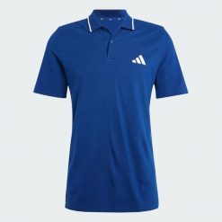Koszulka Essentials 3-Stripes Piqué Polo. Białe koszulki polo Adidas, uniwersalny, bez wzorów, z bawełny, bez kołnierzyka, bez ramiączek. Za 137.83 zł.