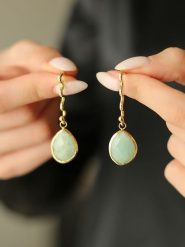 Pierres de Jade Pozłacane kolczyki-wkrętki z amazonitami rozmiar: onesize. Zielone kolczyki Pierres de Jade, pozłacane. Za 39.99 zł.