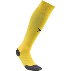 Skarpety Piłkarskie Unisex Dla Dorosłych Liga Core. Żółte skarpety Puma, bez wzorów. Za 80.99 zł.