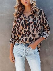 Milan Kiss Bluzka w kolorze jasnobrązowo-czarnym rozmiar: S. Brązowe bluzki Milan Kiss, s, bez wzorów, bez kołnierzyka, bez ramiączek. Za 127.05 zł.