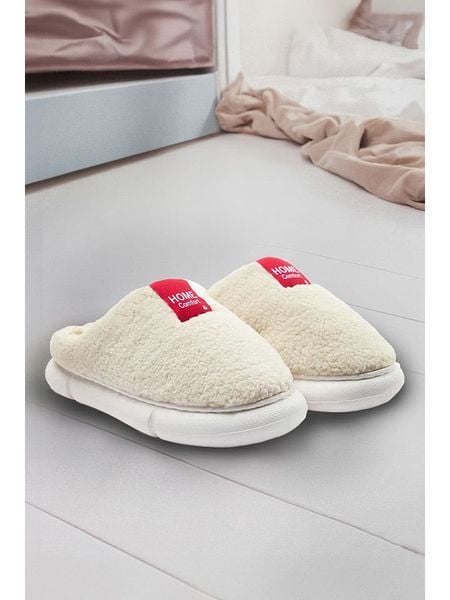 Trendyol Kapcie w kolorze kremowym rozmiar: 39. Brązowe obuwie domowe Trendyol, bez wzorów, z materiału, bez zapięcia. Za 70.08 zł.