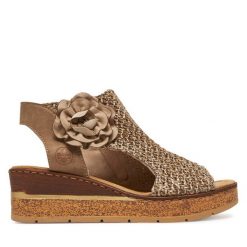 Sandały Rieker. Brązowe sandały Rieker, bez wzorów, bez obcasa, na koturnie, bez zapięcia. Za 359.99 zł.