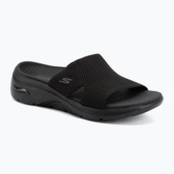 Klapki damskie SKECHERS Go Walk Arch Fit 2.0 Dakota. Czarne klapki Skechers, bez wzorów, bez obcasa. Za 249.99 zł.