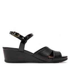 Sandały Geox. Czarne sandały Geox, bez wzorów, bez obcasa, na koturnie, bez zapięcia. Za 429.99 zł.