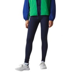 Legginsy treningowe damskie Lacoste. Niebieskie legginsy Lacoste, uniwersalny, bez wzorów, z materiału, długie. Za 317.00 zł.