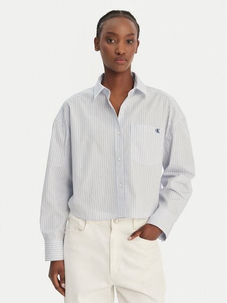 Calvin Klein Jeans Koszula LV047F105G Błękitny Relaxed Fit. Niebieskie koszule Calvin Klein Jeans, s, bez wzorów, z bawełny, bez kołnierzyka, bez ramiączek. Za 251.99 zł.