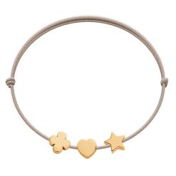 Bransoletka z pozłacaną koniczyną, sercem i gwiazdką Etincelle na cienkim beżowym sznurku. Brązowe bransoletki Lilou, pozłacane. Za 237.00 zł.