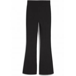Damskie rozkloszowane legginsy HER z wysokim stanem PUMA Black. Czarne legginsy Puma, l, bez wzorów, z podwyższonym stanem. Za 159.00 zł.