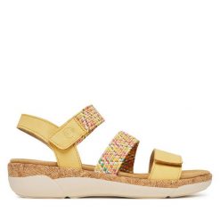 Sandały Remonte. Żółte sandały Remonte, bez wzorów, bez obcasa, na koturnie, bez zapięcia. Za 349.99 zł.
