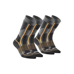 Skarpety turystyczne SH520 X-WARM MID. Szare skarpety QUECHUA, bez wzorów, z elastanu. Za 59.99 zł.