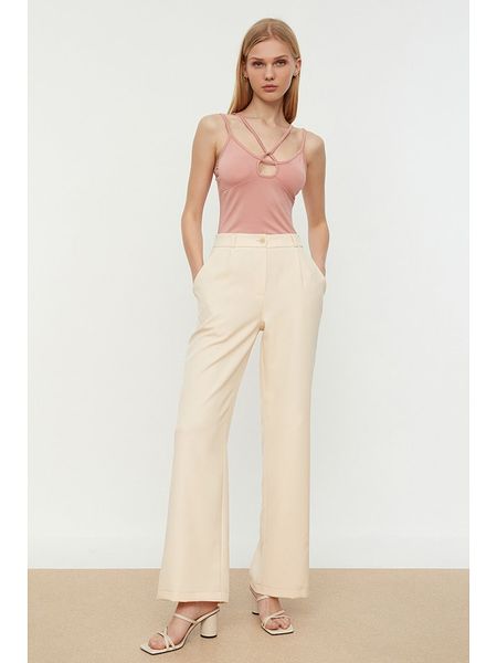 Trendyol Spodnie w kolorze beżowym rozmiar: 40. Brązowe spodnie materiałowe Trendyol, bez wzorów, z materiału. Za 56.79 zł.