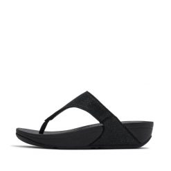 Klapki między palcami damskie FitFlop Lulu Shimmerglitz. Czarne klapki FIT FLOP, bez wzorów, bez obcasa. Za 443.50 zł.