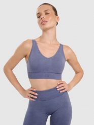 4F Biustonosz do jogi i pilatesu ze średnim wsparciem damski - granatowy XS/S. Niebieskie bielizna sportowa 4f, l, bez wzorów, z gumy. Za 119.99 zł.