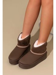 C'M Botki zimowe w kolorze brązowym rozmiar: 36. Brązowe botki C'M, na zimę, bez wzorów, bez obcasa, na platformie, bez zapięcia. Za 108.99 zł.