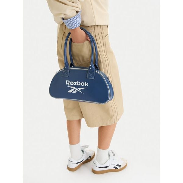 Torebka Reebok. Niebieskie torebki klasyczne Reebok, bez wzorów, bez dodatków. Za 100.99 zł.