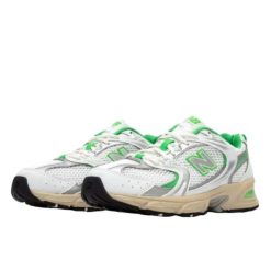 Buty do chodzenia dla dorosłych New Balance 530 White Palm Leaf. Białe obuwie sportowe New Balance, bez zapięcia, trekkingowe. W wyprzedaży za 466.45 zł.