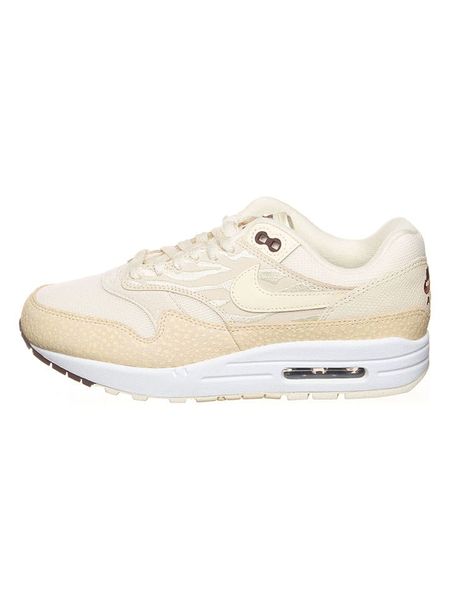 Nike Skórzane sneakersy "Air Max 1 '87" w kolorze kremowo-beżowym rozmiar: 36. Brązowe trampki Nike, bez wzorów, bez zapięcia. Za 226.24 zł.