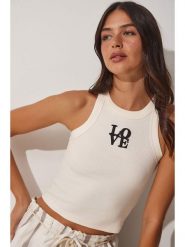 Happiness Istanbul Top w kolorze kremowym rozmiar: S/M. Brązowe koszulki sportowe Happiness Istanbul, bez wzorów, bez ramiączek. Za 51.45 zł.