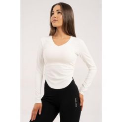 Koszulka fitness damska Gym Glamour wycięta z długimi rękawami. Białe bluzki GYM GLAMOUR, l, bez wzorów, glamour, bez kołnierzyka, bez ramiączek. Za 149.99 zł.
