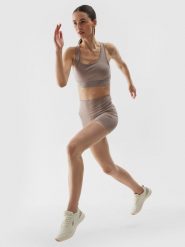 4F Legginsy krótkie treningowe z materiału z recyklingu damskie - beżowe S. Brązowe legginsy 4f, l, bez wzorów, z dzianiny, z podwyższonym stanem, do biegania. W wyprzedaży za 39.99 zł.