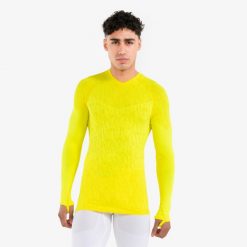 Podkoszulek termiczny z długim rękawem Kipsta Keepdry. Żółte bielizna sportowa KIPSTA, s, bez wzorów, z elastanu. Za 59.99 zł.