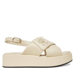 Sandały Tommy Hilfiger. Brązowe sandały TOMMY HILFIGER, bez wzorów, bez obcasa, na koturnie, bez zapięcia. Za 459.99 zł.