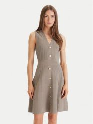 Guess Sukienka codzienna W6GK53 Z0658 Zielony Regular Fit. Zielone sukienki Guess, na co dzień, xl, z aplikacjami, z syntetyku, bez kołnierzyka, bez ramiączek, proste. Za 669.99 zł.