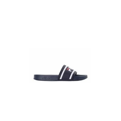 Klapki damskie Fila Morro Bay Slipper. Niebieskie klapki Fila, bez wzorów, z materiału, bez obcasa. Za 143.50 zł.