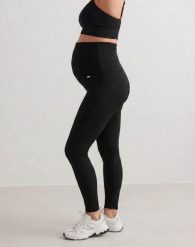 Damskie legginsy ciążowe prążkowane, bezszwowe Ribbed Seamless czarne. Czarne legginsy AIM'N, m, bez wzorów, z dzianiny, z podwyższonym stanem, długie. Za 258.00 zł.