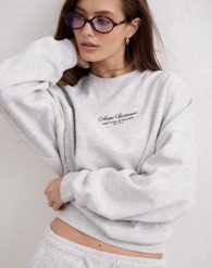 Damska bluza dresowa z okrągłym dekoltem, miękka luźna Script jasnoszary melanż. Szare bluzy AIM'N, s, bez wzorów, z bawełny, bez kaptura. Za 339.00 zł.