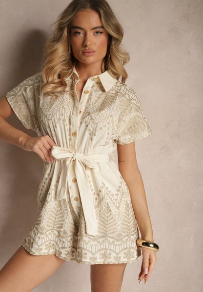 Beżowy Kombinezon z Bawełny z Kołnierzykiem i Paskiem Zdobiony Haftem Zarinorie. Brązowe sukienki Renee, na co dzień, l, z aplikacjami, z bawełny, eleganckie, bez kołnierzyka, bez ramiączek, mini, kopertowe. Za 129.99 zł.