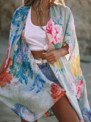 Milan Kiss Kimono w kolorze błękitnym ze wzorem rozmiar: S. Niebieskie swetry Milan Kiss, s, bez wzorów, bez ramiączek. Za 109.78 zł.