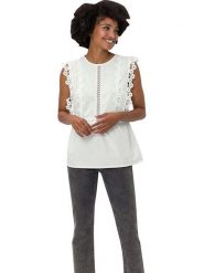 Heine Bluzka w kolorze kremowym rozmiar: 42. Brązowe bluzki Heine, bez wzorów, z koronki, bez kołnierzyka, bez ramiączek. Za 60.99 zł.