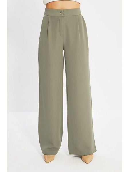 Trendyol Spodnie w kolorze khaki rozmiar: 36. Brązowe spodnie materiałowe Trendyol, bez wzorów, z materiału. Za 47.95 zł.