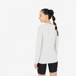 Koszulka turystyczna damska z długim rękawem Quechua MH500. Brązowe bluzki QUECHUA, xl, bez wzorów, z materiału, sportowe, bez kołnierzyka, bez ramiączek. Za 79.99 zł.