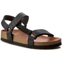 Sandały Scholl. Czarne sandały Scholl, bez wzorów, bez obcasa, na płaskiej podeszwie, bez zapięcia. Za 229.99 zł.