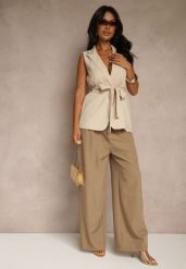 Brązowe Spodnie o Szerokim Kroju High Waist Dolarenna. Brązowe spodnie materiałowe Renee, na co dzień, l, bez wzorów, z jeansu, z podwyższonym stanem. Za 109.99 zł.