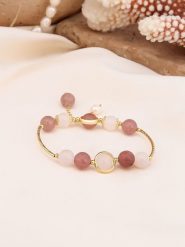 Pierres de Jade Pozłacana bransoletka z perłami i kwarcem rozmiar: onesize. Brązowe bransoletki Pierres de Jade, z kwarcem, pozłacane. Za 39.99 zł.