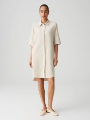 OPUS Sukienka "Winchesta" w kolorze kremowym rozmiar: 36. Brązowe sukienki Opus, bez wzorów, bez kołnierzyka, bez ramiączek, midi. Za 220.63 zł.