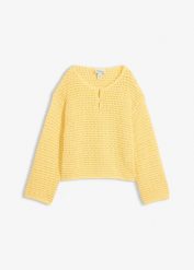 Sweter ażurowy oversize, o kroju pudełkowym. Żółte swetry bonprix, w ażurowe wzory, z bawełny, bez ramiączek. Za 129.99 zł.