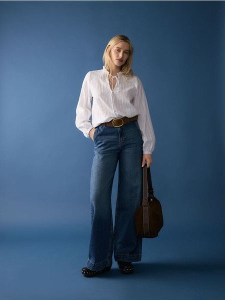 Jeansy wide leg - granatowy. Niebieskie jeansy Reserved, bez wzorów. W wyprzedaży za 89.99 zł.