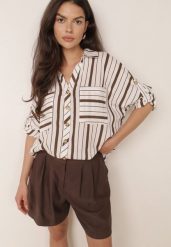 Brązowa Letnia Koszula Oversize z Bawełny w Paski z Nietoperzowymi Rękawami Sheilla. Brązowe koszule Born2be, bez wzorów, z bawełny, eleganckie, bez kołnierzyka, bez ramiączek. Za 99.99 zł.
