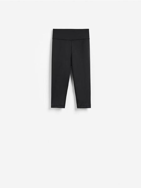 Legginsy capri - czarny. Czarne legginsy Reserved, l, bez wzorów, z dzianiny. Za 69.99 zł.