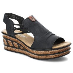 Granatowe Sandały Rieker Modne Obuwie Damskie. Niebieskie sandały Rieker, bez wzorów, ze skóry ekologicznej, eleganckie, bez obcasa, na koturnie, bez zapięcia. Za 287.90 zł.